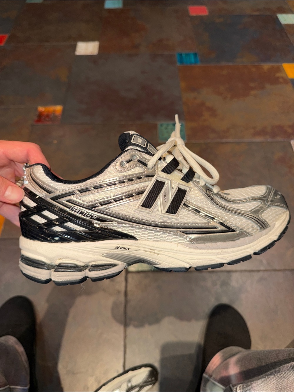 New Balance Silver and Black Athletic Sneaker